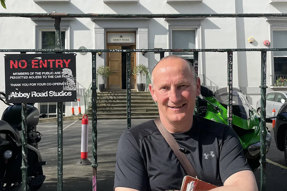 Your London Cabbie stood outside Abbey Road Studios, London