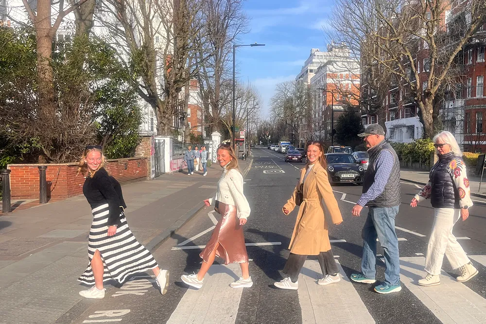 Your London Cabbie guests having fun recreating the zebra crossing photo outside Abbey Road Studios